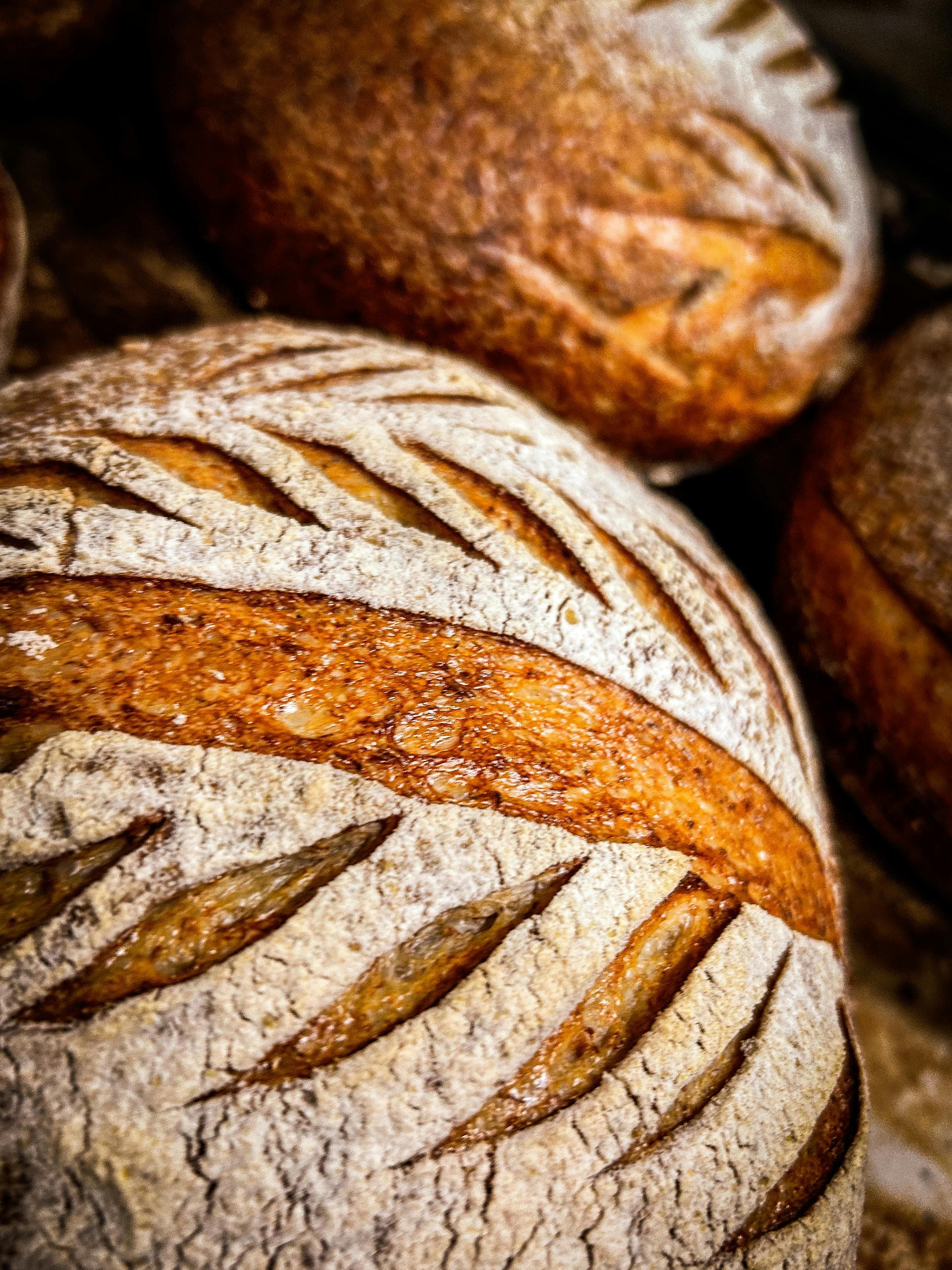 Fresh baked sourdough bread stacked together